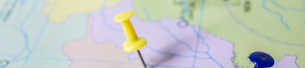 pushpin showing the location of a destination point on a map